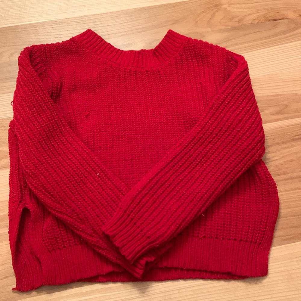 SMOKE FREE HOUSEHOLD. Girls red sweater. With splits on side